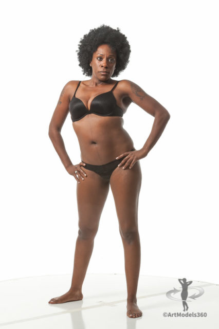 African American female art model in a standing pose