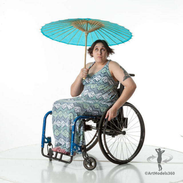 360 degree rotating art reference photos of a woman with spina bifida sitting in a wheelchair holding a parasol