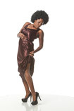 African-American female art model in an action pose wearing a dress