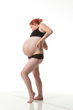 Art reference photos of 9 months pregnant woman standing