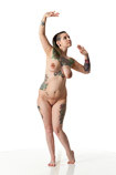 360 degree rotatable art reference photo of a nude female art model in a pose perfect for sculptors, painters and art students