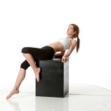360 degree rotatable images of a female artist's figure dressed in yoga pants and sports bra model sitting on the edge of a box