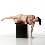 360 degree rotatable images of a nude female artist's figure model with a real woman build laying on her side on a box