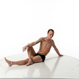 360 degree photos of a slim male art figure model sitting and leaning back