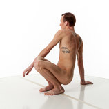 360 degree photos of a slim nude male art figure model squatting