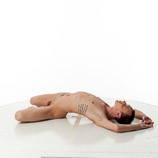 360 degree photos of nude male art model laying on the floor