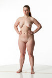 Artist reference photos of a nude curvy full figured female figure model posed in a standing pose for sculpture and painting reference.