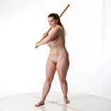 Artist reference photos of a nude curvy full figured female figure model posed in a standing pose for sculpture and painting reference.