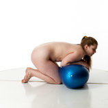 Artist reference photos of a nude curvy full figured female figure model posed with an exercise ball