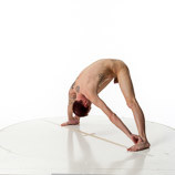 360 degree artist reference photos of a slim nude male art figure model bent over with his hands on the floor