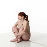 360 degree artist reference photos of a nude pregnant woman in a sitting pose for sculpture and painting reference