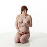360 degree artist reference photos of a nude pregnant woman in a kneeling pose for sculpture and painting reference