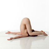 360 degree art reference photos of a nude female art model with natural pubic hair laying on the floor with her butt in the air