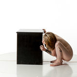 360 degree rotatable artist reference photos of a slim nude blond female art model posed next to a box