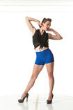 360 degree artistic reference photos of a classic slim pin-up model in blue shorts and a tied top