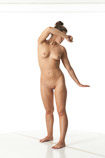 Nude 360 degree reference photos of a brunette female art model in poses for digital artists and sculpture students
