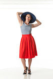 360 degree art reference photos of a young classic pin-up model in a red skirt and stripped shirt with a wide brimmed hat
