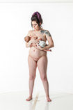 Nude 360 degree photos of a new mother nursing her infant