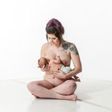 360 degree nude art reference photos of a new mother nursing her infant in posed for painters and sculptors and art students