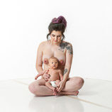 360 degree nude art reference photos of a new mother nursing her infant in posed for painters and sculptors and art students