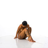 Expressive 360 degree art reference photos of a slim African American nude female art model for use by figure artists and art students